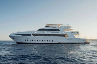 The Sea Serpent Excellence liveaboard yacht at anchor, side view
