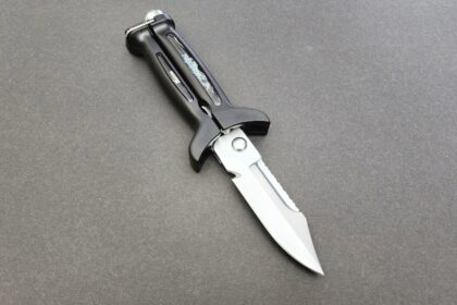 XS Scuba FogCutter X dive knife with black handle and stainless blade with a serrated section