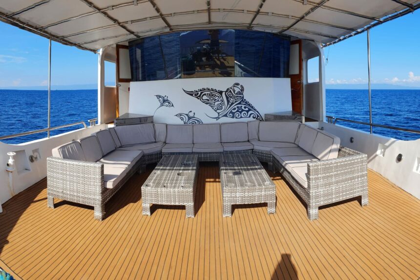 sun deck sofa seating with manta ray mural aboard the Seadoors