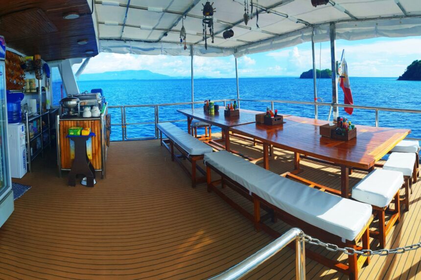 outdoor dining benches with sea view aboard the Seadoors