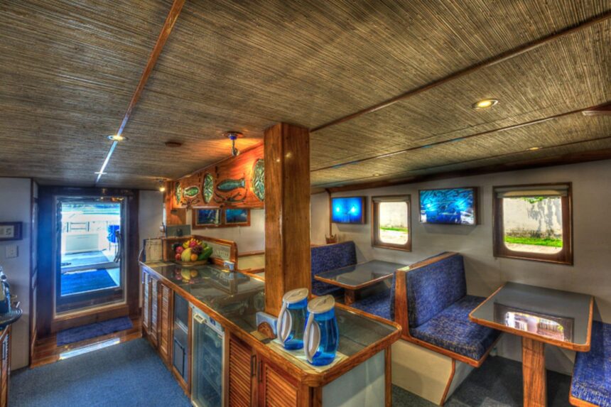 dining salon with wooden bar aboard the MV Ocean Hunter III