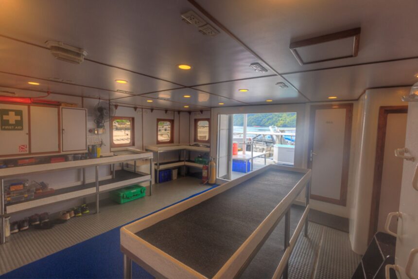 dive gear prep area with storage boxes aboard the MV Ocean Hunter III