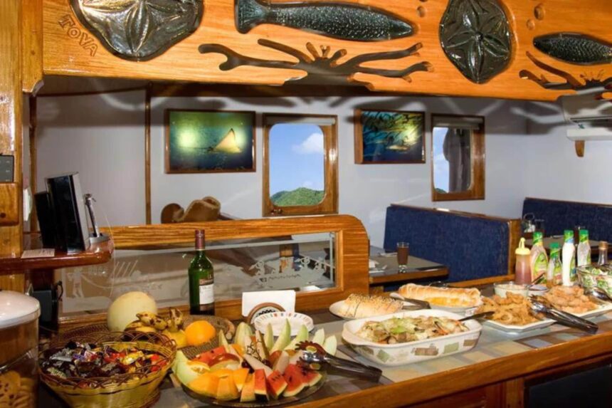 Fresh fruit, salads and seafood laid out on the Ocean Hunter III's dining buffet