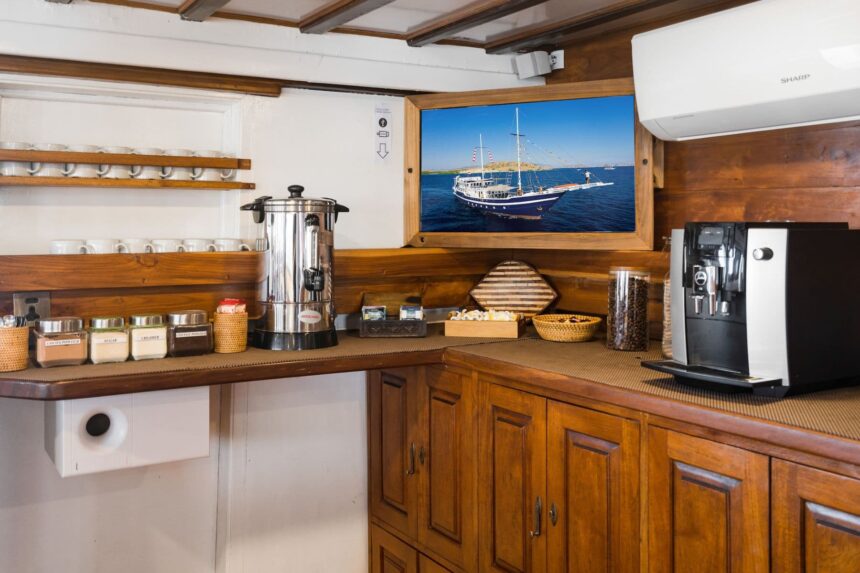 Coffee and tea station on the MSY Seahorse with a photo of the boat and jars of snacks