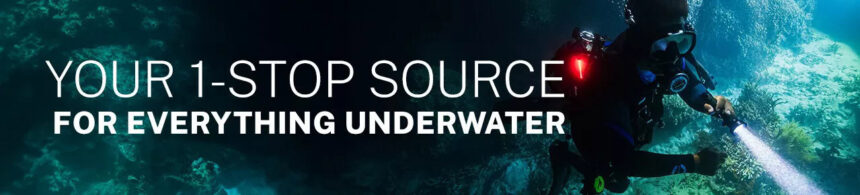 Scuba.com banner reading Your 1-Stop Source For Everything Underwater over a diver with a torch on a reef