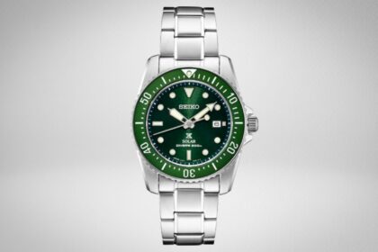 Seiko SNE583 Prospex solar diver with green dial and matching green bezel on a steel bracelet