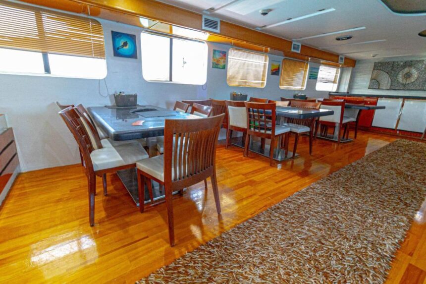 Dining tables and chairs in the Betelgueser's indoor dining room