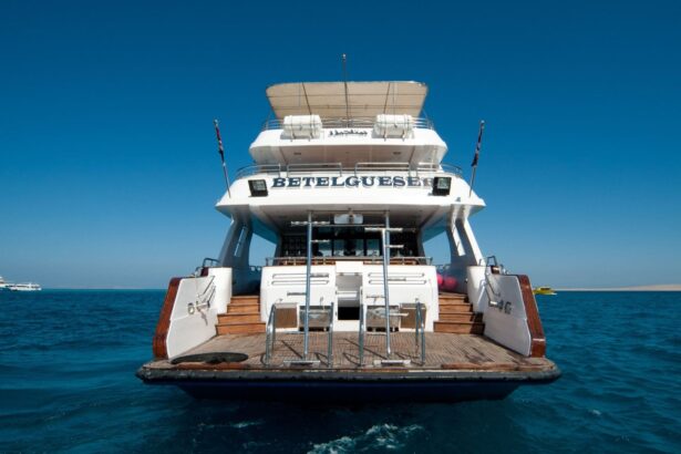 Stern view of the liveaboard yacht Betelgueser anchored at sea
