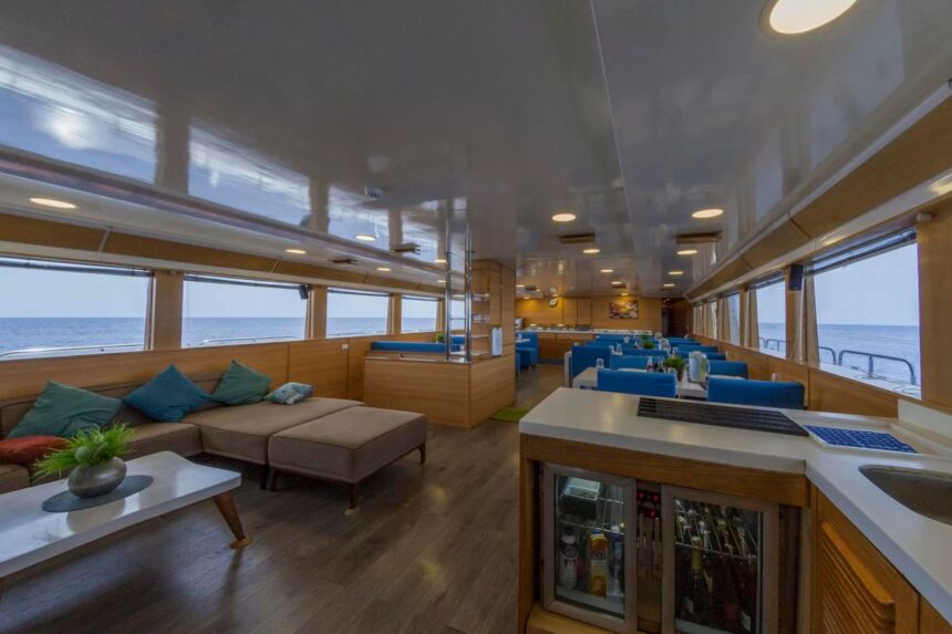 Lounge and bar area aboard the MY Blue with sofa seating