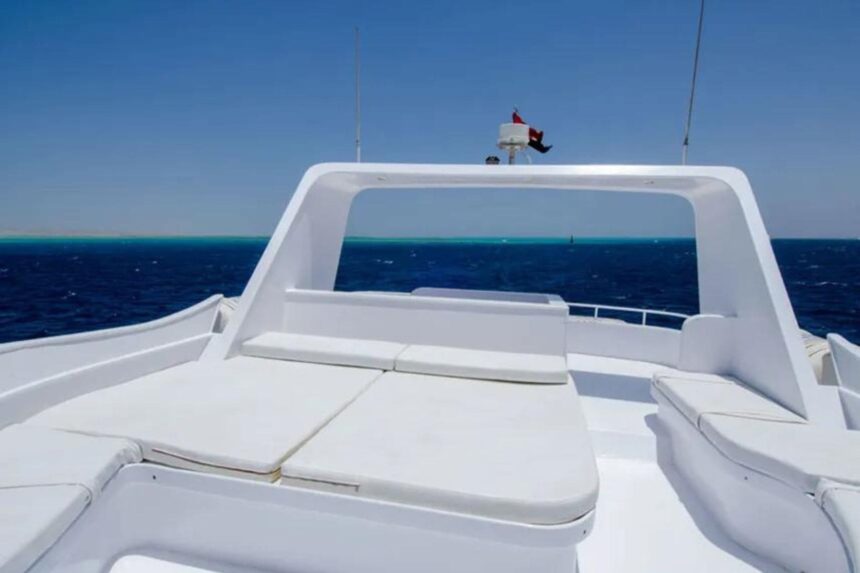 White cushioned bow seating on the MY Blue Planet 1's top deck