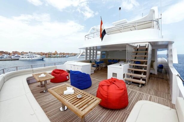 Deck seating with bean bags and Egyptian flag overlooking the marina on the MY Blue Pearl