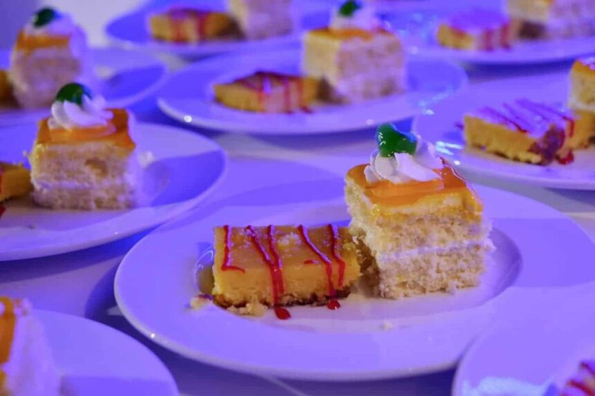 Individually plated dessert cakes with fruit drizzle for guests on the MY Blue Storm