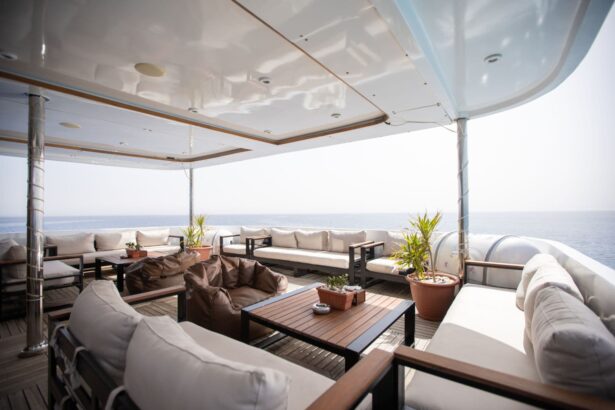 Covered deck seating area with sofas and potted plants on the Captain Sparrow