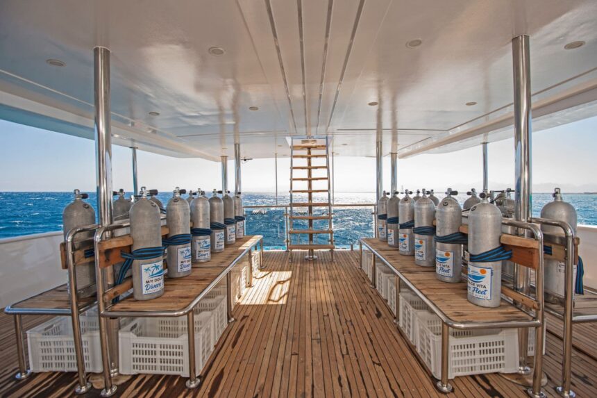 Rows of nitrox tanks lined up on the Dolce Vita's dive deck