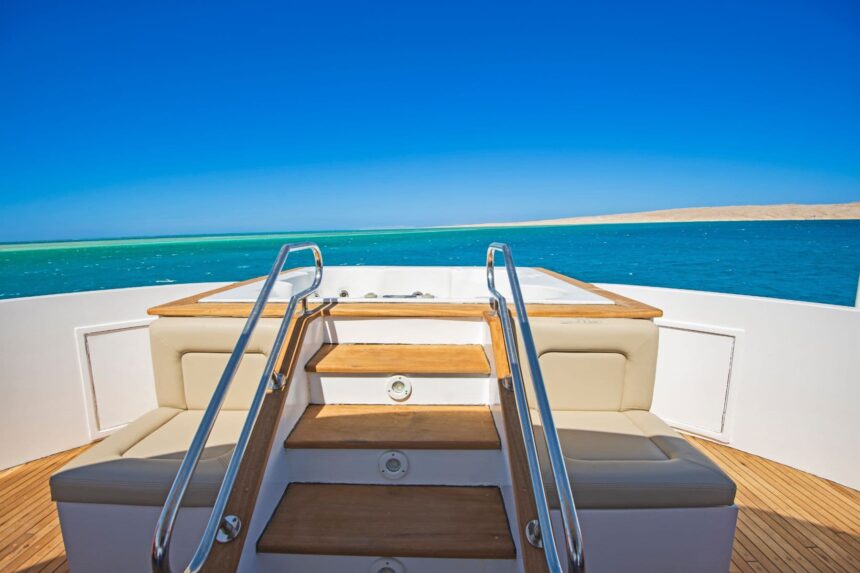 Sun loungers on the open deck of the Dolce Vita with the sea in the background