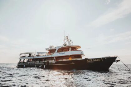 Solmar V liveaboard dive boat at sea during golden hour