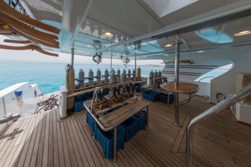 Shaded lounge seating on the Golden Dolphin I liveaboard's upper deck