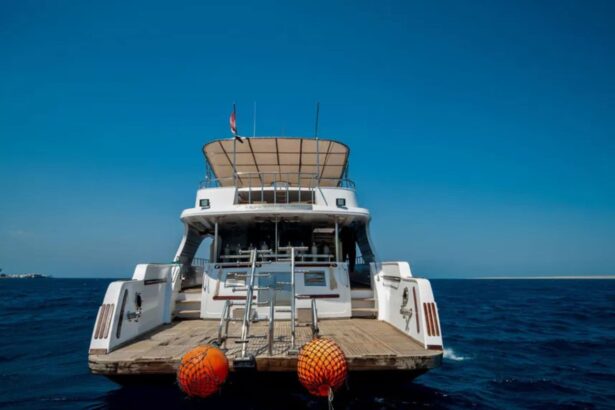 Stern view of the Golden Dolphin I liveaboard with dive platform and ladder