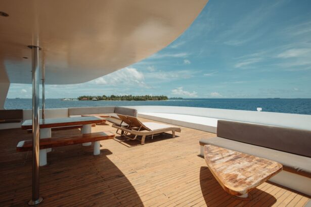 Shaded sun deck with sofas overlooking the ocean on the Adora