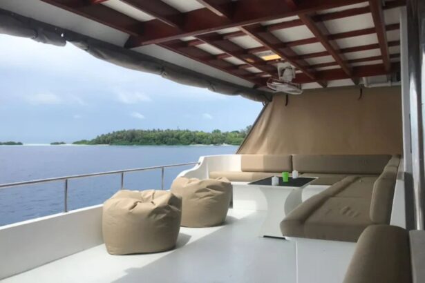 Shaded outdoor seating area with beanbags and sofas aboard the Amba