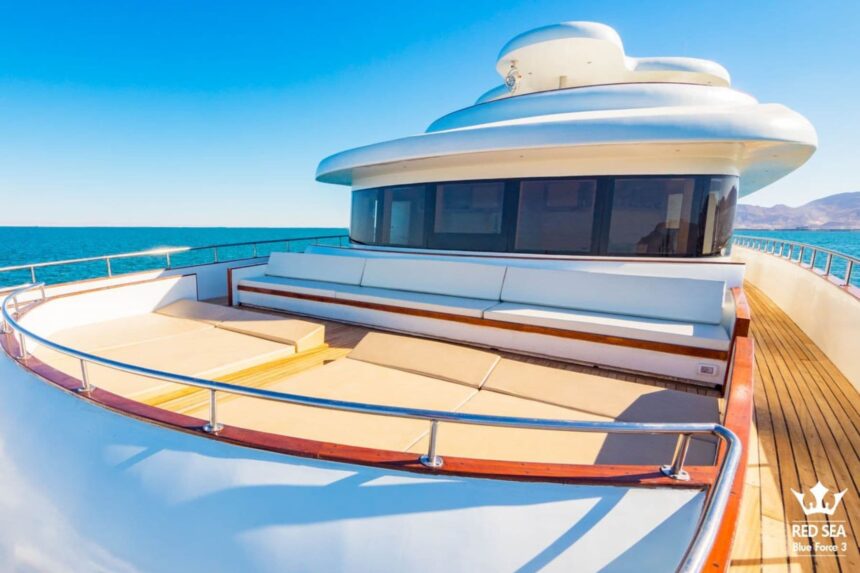 Sun deck with cushioned bench seating on the bow of the Blue Force 3 liveaboard