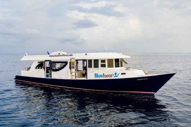 Maldives Blue Force III liveaboard dive boat at anchor in calm water