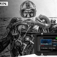 Garmin Descent X50i dive computer displaying dive data, layered over an illustrated rebreather diver