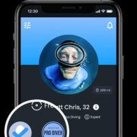 Diving Buddy app profile screen highlighting a verified photo badge and pro diver badge