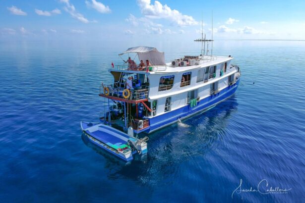 aerial view of the Narayana liveaboard sailing on calm water
