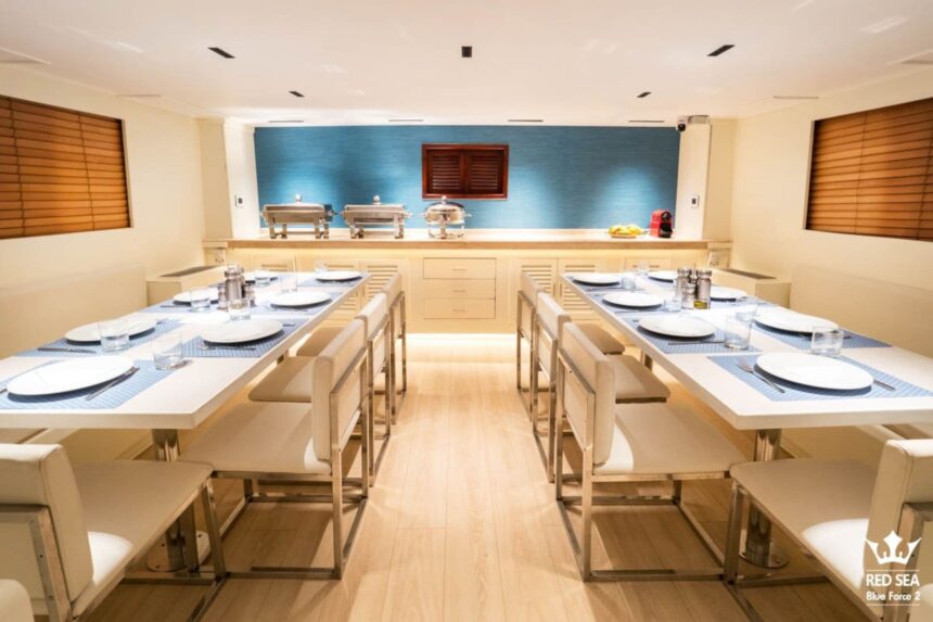 dining room set with two long tables aboard Red Sea Blue Force 2