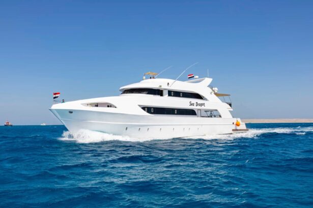Sea Dragon liveaboard dive yacht underway with Egyptian flags flying