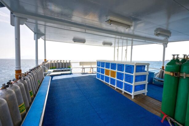 Scuba tanks and gear crates lined up on the M/Y Resolute dive deck