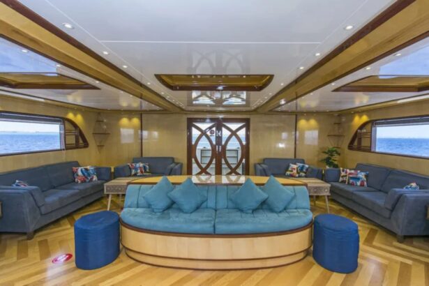 Shaded deck seating with sofas and a coffee table aboard the Golden Dolphin IV