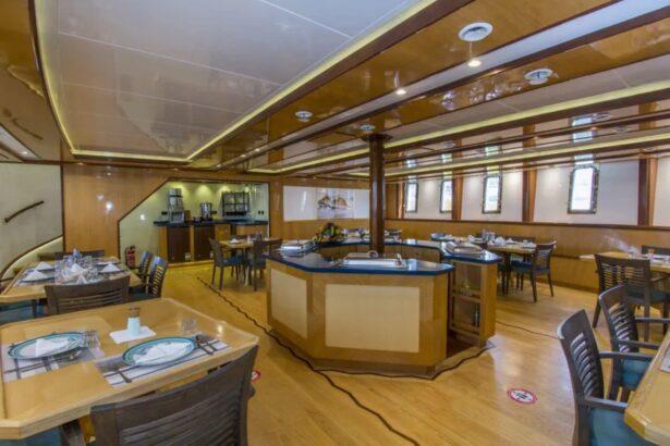 Dining area set for a meal aboard the Golden Dolphin IV