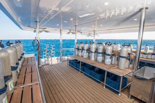 Rows of dive tanks on the shaded deck of the SS Glorious Miss Nouran