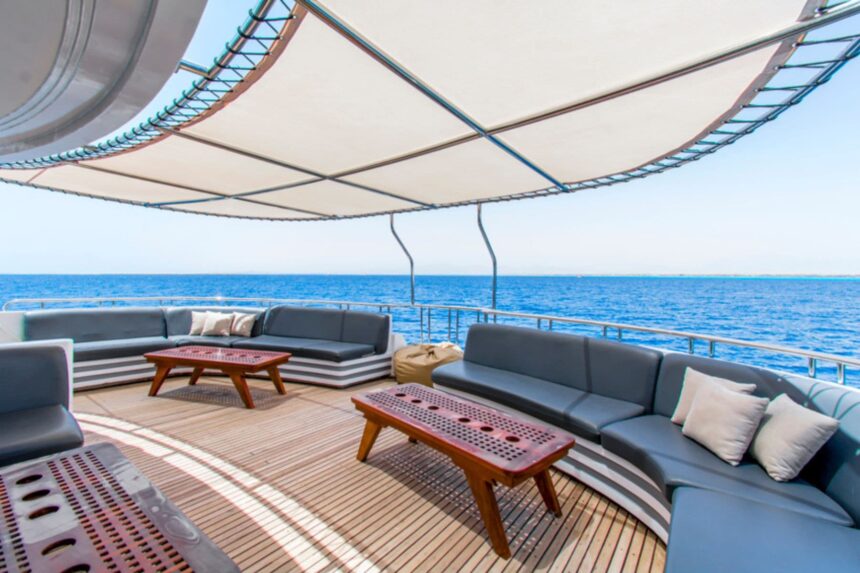 curved navy sofas on the shaded sun deck of the Golden Dolphin III