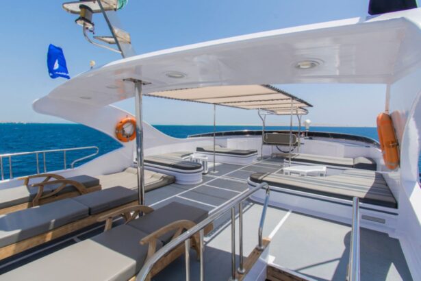 shaded sun deck with loungers and ocean views aboard the Golden Dolphin III