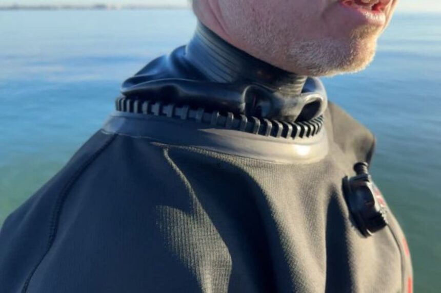 Neck Seal On The Hollis DX-300X Close-up of the Hollis DX-300X neck seal and collar on our tester at the waterline