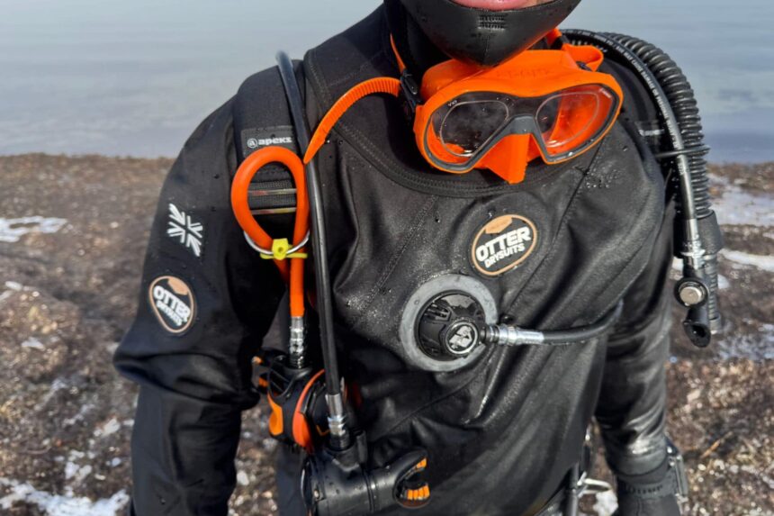 Otter Britannic Mk2 Chest And Hood Torso of the Otter Britannic Mk2 Telescopic drysuit with hood, orange mask and chest inflator valve