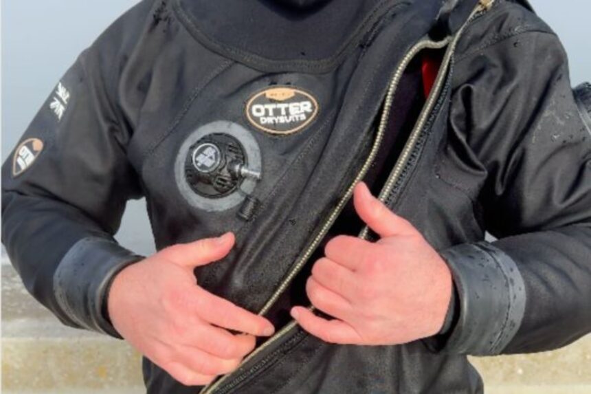 Otter Britannic Mk2 Front Zipper Tester opening the front entry zipper on the Otter Britannic Mk2 Telescopic drysuit after a dive