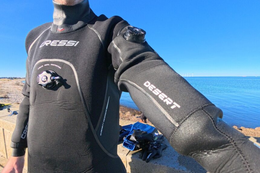 Chest inflator and shoulder exhaust valves on the Cressi Desert drysuit worn by our tester