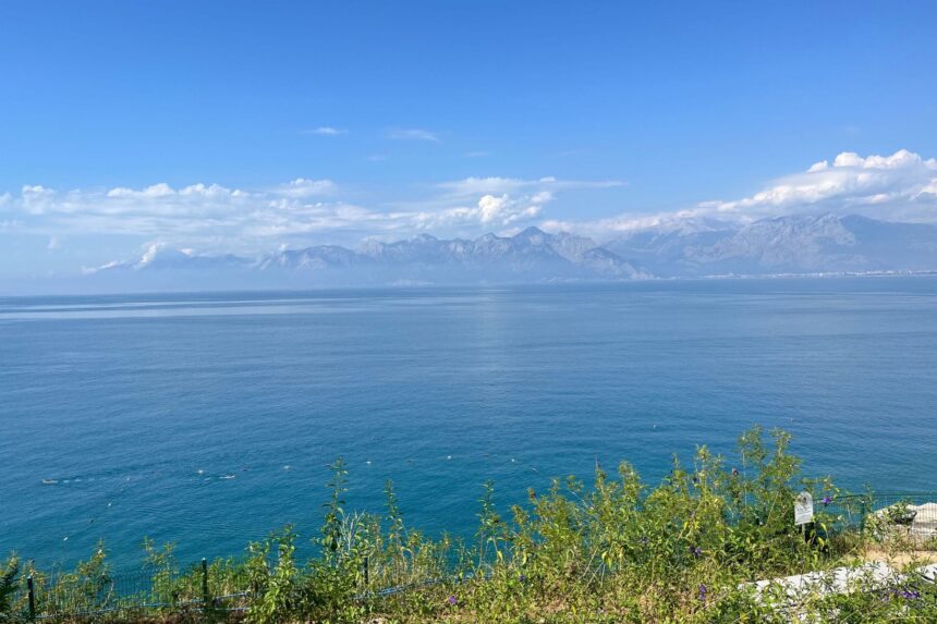 Calm blue sea backed by hazy mountain ranges along the Turkish coast