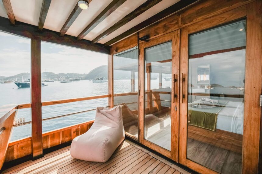 private balcony with a beanbag chair outside a cabin on the Indo Master liveaboard