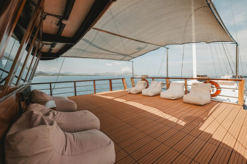shaded sun deck with beanbag loungers overlooking the water on the Indo Master