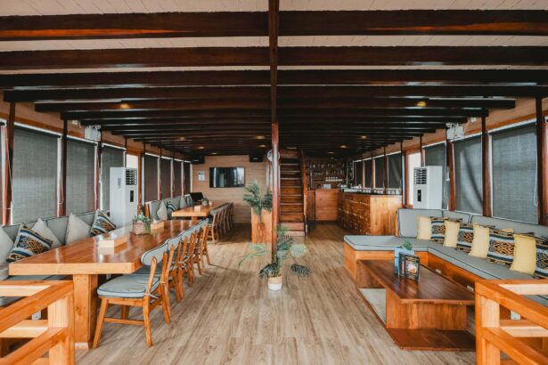 Wood paneled dining and lounge area on the Indo Master liveaboard