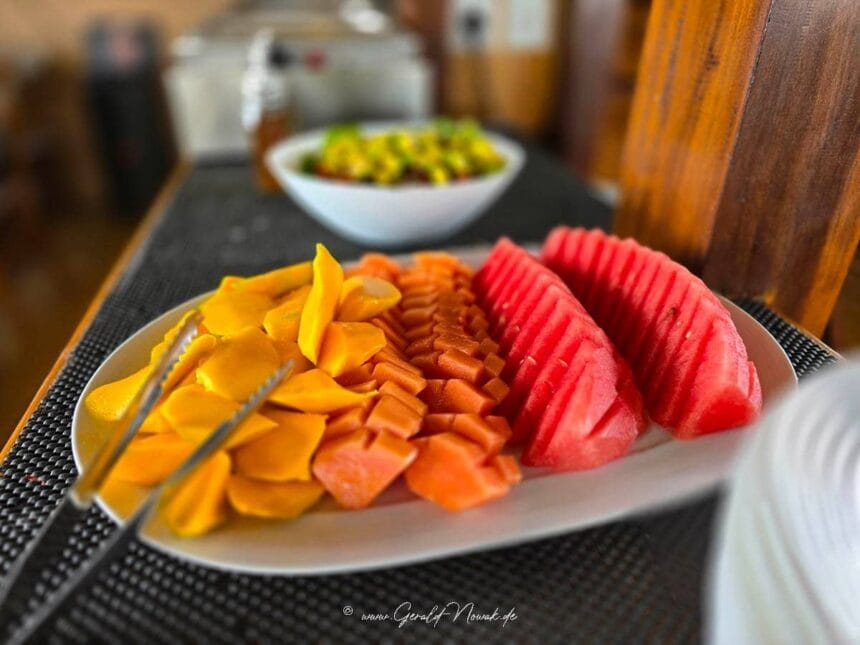 Sliced mango, papaya and watermelon plated aboard the Indo Master