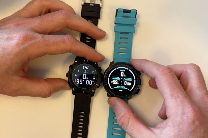Hands holding a black Garmin dive computer and a teal strapped Suunto Ocean side by side