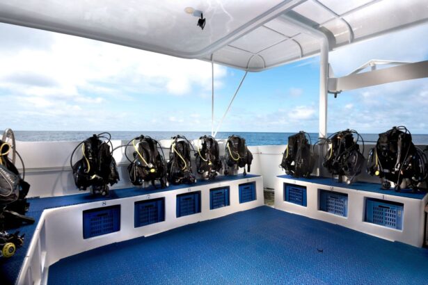 Rows of scuba gear set up and ready on the dive deck