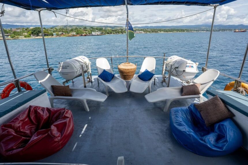 Sundeck lounge chairs and bean bags on the top deck of the Solomons Master