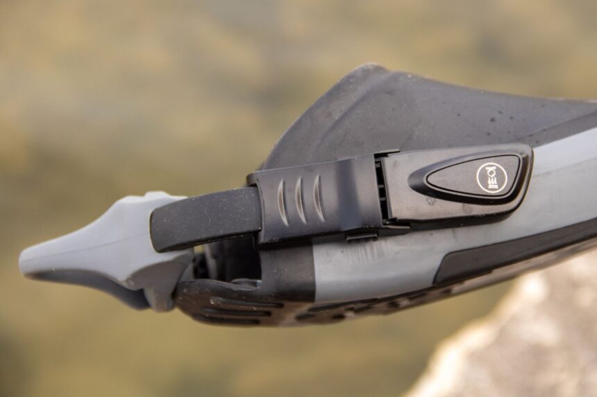 Close-up of the quick-release buckle and heel strap on the Fourth Element Rec fin